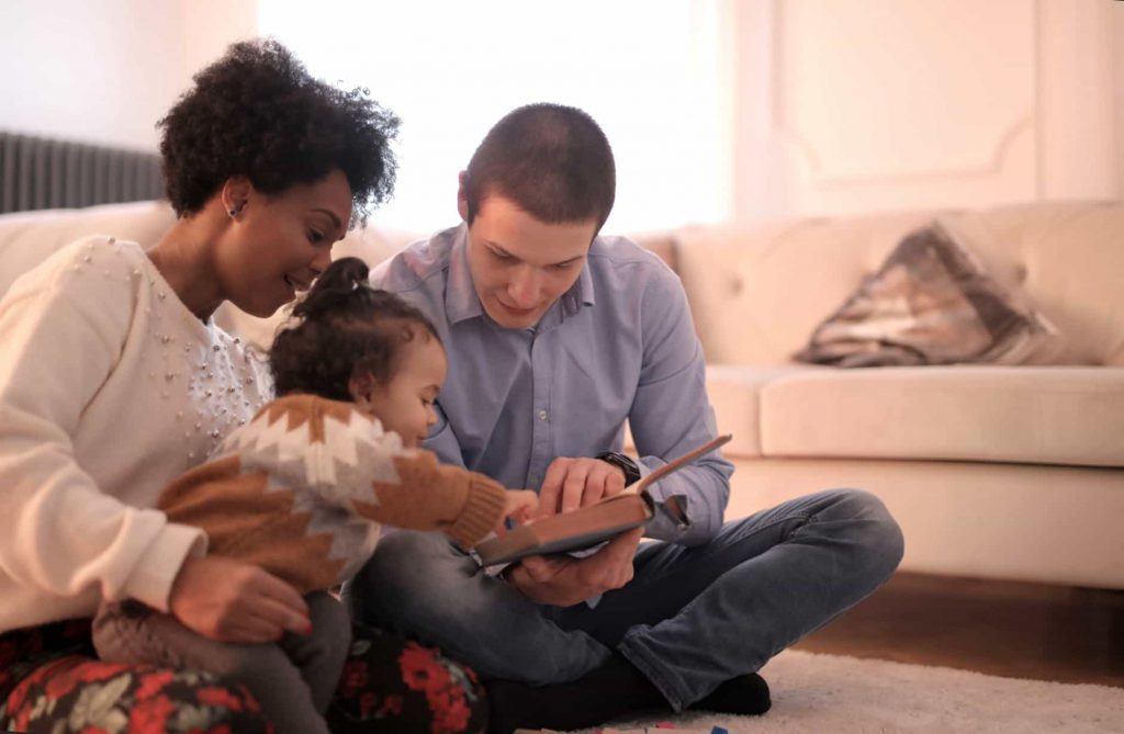 Image of a family sitting at home together